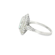 Platinum Pariaba Tourmaline and Diamond Halo Rings