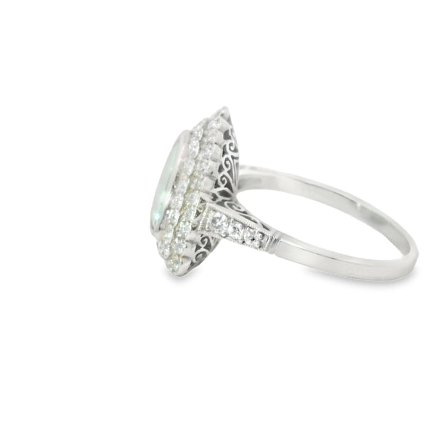 Platinum Pariaba Tourmaline and Diamond Halo Rings
