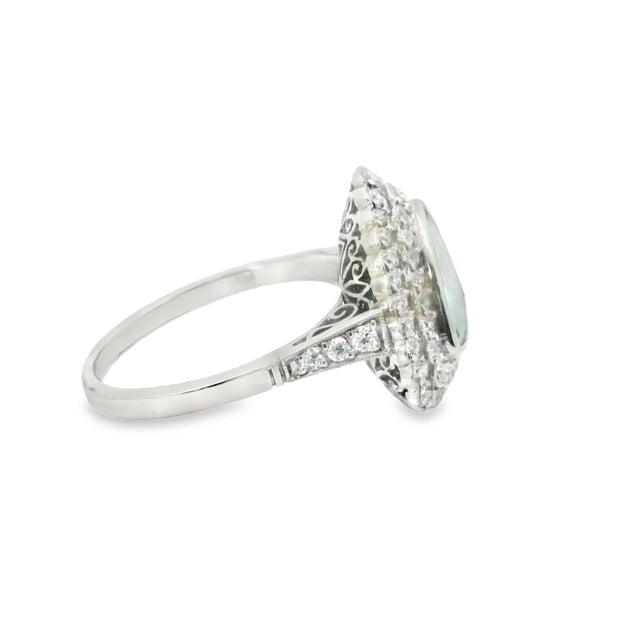 Platinum Pariaba Tourmaline and Diamond Halo Rings