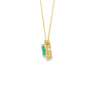Emerald and Diamond Halo Pendant